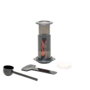 Aeropress Orignal shown with coffee scoop, stirrer and filter papers