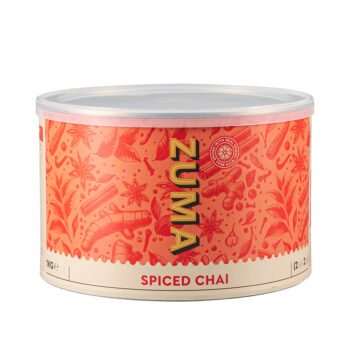 Zuma Spiced Chai. orange tin decorated with images of the spices used to make the chai powder